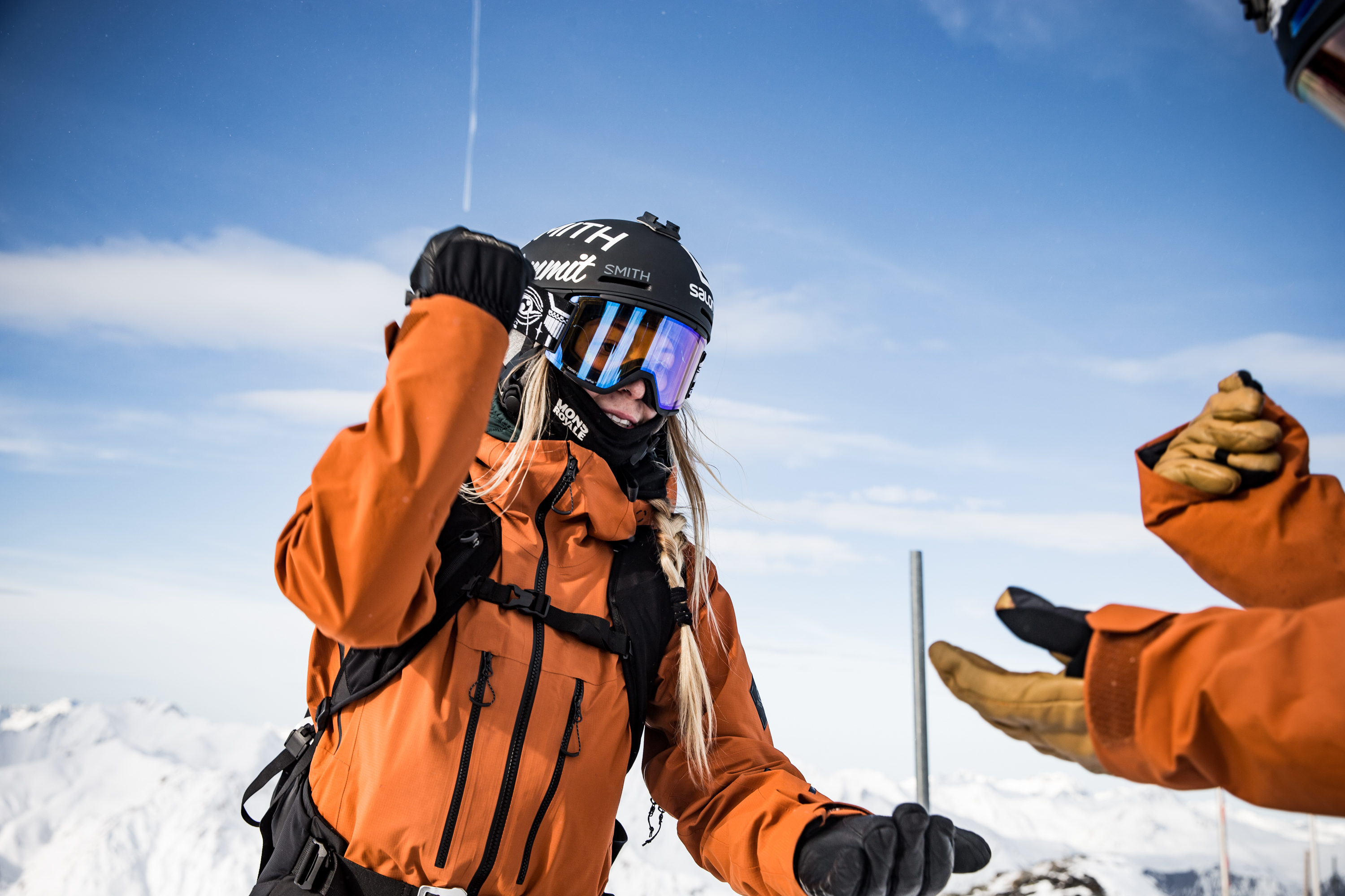 Riders celebrating at the summit